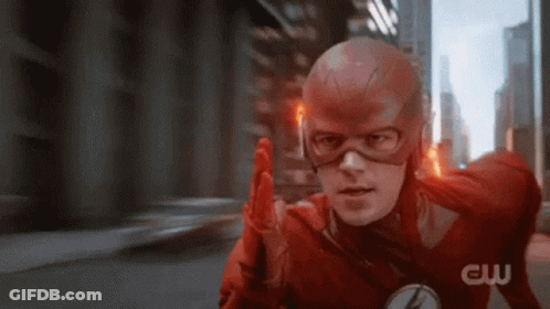A Close Up Of A Man In A Flash Suit And Mask . GIF