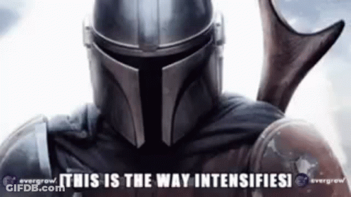A Close Up Of A Man In A Helmet With The Words `` This Is The Way Intensifies '' . GIF