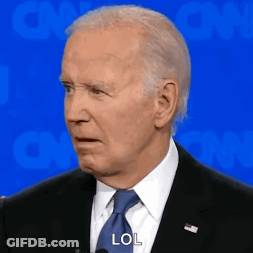Close Up Of Man In Suit Making Funny Face GIF