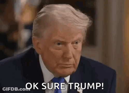 A Close Up Of A Man In A Suit And Tie Saying Ok Sure Trump . GIF