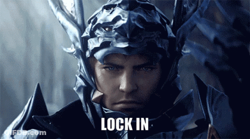 A Close Up Of A Man In Armor With The Words Lock In Behind Him GIF