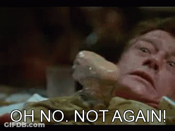 A Close Up Of A Man Laying On A Bed With The Words `` Oh No , Not Again '' Written On The Bottom . GIF