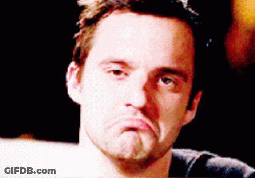 A Close Up Of A Man Making A Face GIF
