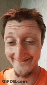 A Close Up Of A Man Making A Face With His Eyes Closed GIF