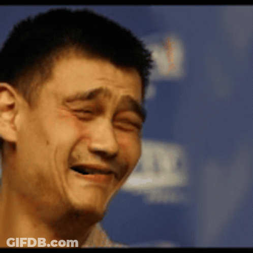 A Close Up Of A Man Making A Face With His Eyes Closed GIF