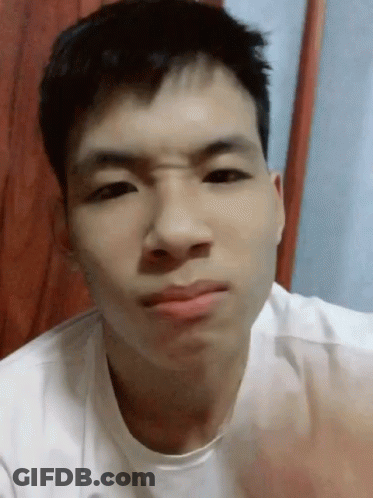 A Close Up Of A Man Making A Funny Face GIF
