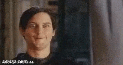 A Close Up Of A Man Making A Funny Face While Looking At The Camera . GIF