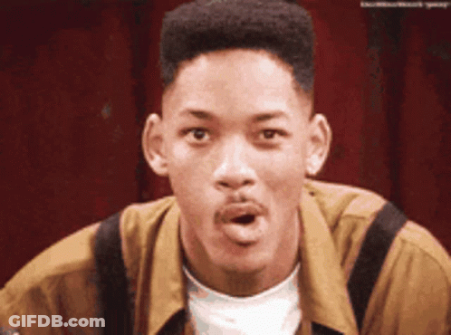 A Close Up Of A Man Making A Funny Face With His Mouth Open GIF