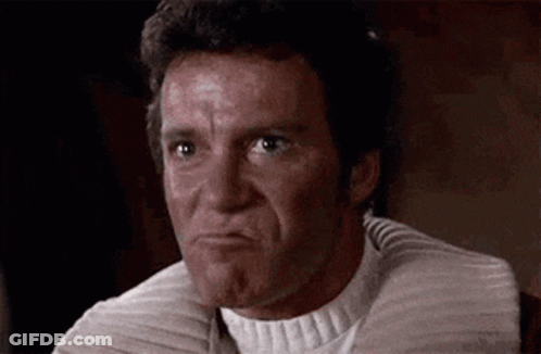 A Close Up Of A Man Making A Funny Face With His Mouth Open . GIF