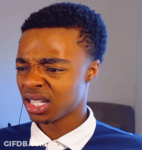 A Close Up Of A Man Making A Funny Face With His Mouth Open GIF