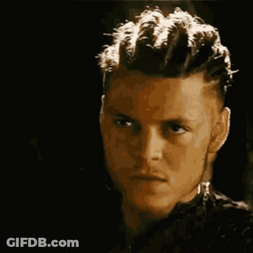 A Close Up Of A Man Making A Funny Face With His Mouth Open . GIF