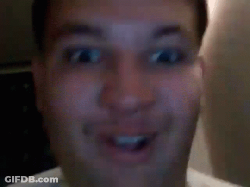 A Close Up Of A Man Making A Funny Face With His Tongue Hanging Out . GIF