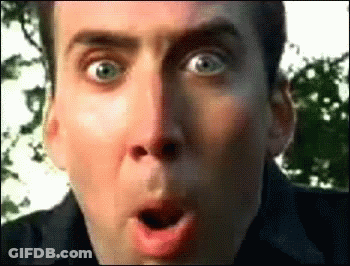 A Close Up Of A Man Making A Surprised Face GIF