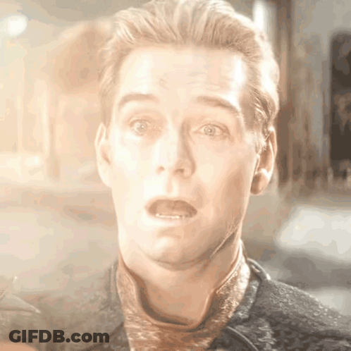 A Close Up Of A Man Making A Surprised Face GIF