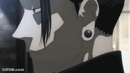 A Close Up Of A Man 'S Ear With A Piercing In It . GIF