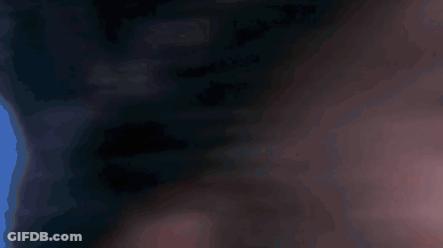 A Close Up Of A Man 'S Eye With A Blue Pupil GIF