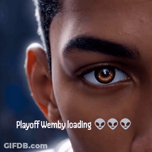 A Close Up Of A Man 'S Eye With The Words " Playoff Wemby Loading " Below It GIF