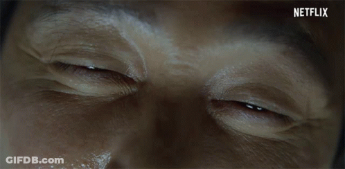 A Close Up Of A Man 'S Eyes With Netflix Written On The Bottom Right GIF