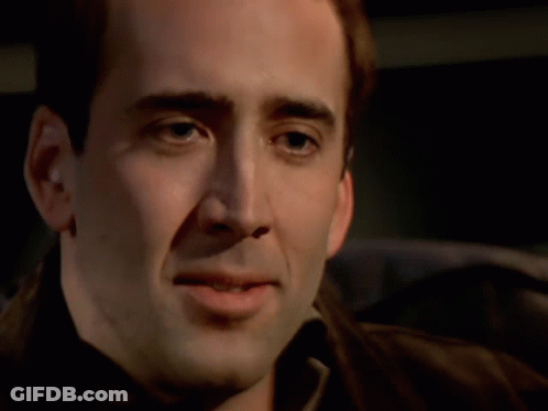 A Close Up Of A Man 'S Face And Neck GIF