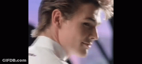 A Close Up Of A Man 'S Face And Neck . GIF
