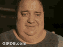 A Close Up Of A Man 'S Face And Neck GIF
