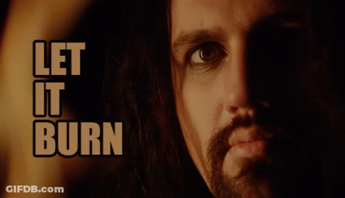 A Close Up Of A Man 'S Face And The Words Let It Burn GIF