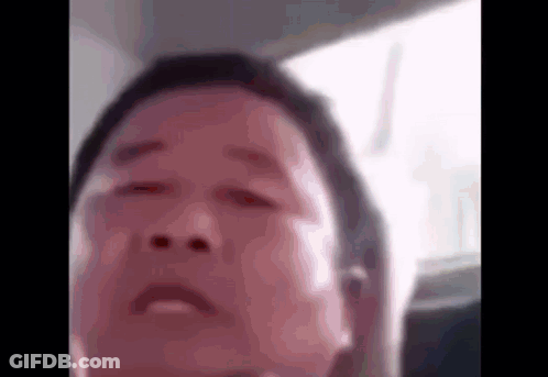 A Close Up Of A Man 'S Face In A Car With His Eyes Closed GIF