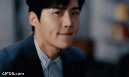 A Close Up Of A Man 'S Face In A Suit GIF