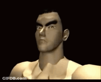 A Close Up Of A Man 'S Face In A Video Game In A Dark Room . GIF