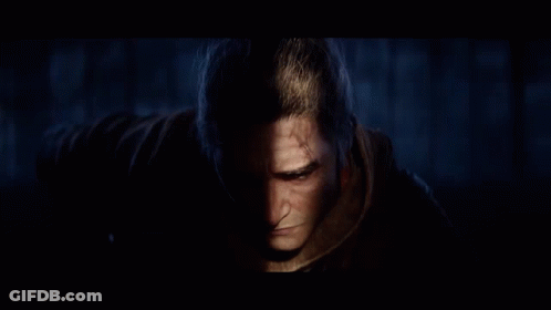 A Close Up Of A Man 'S Face In A Video Game With A Quote That Says Defend Him With Your Life . GIF