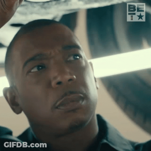 A Close Up Of A Man 'S Face In Front Of A Be T Logo GIF