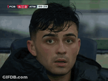 A Close Up Of A Man 'S Face In Front Of A Scoreboard That Says Fcb 4 3 Atm 85:28 GIF
