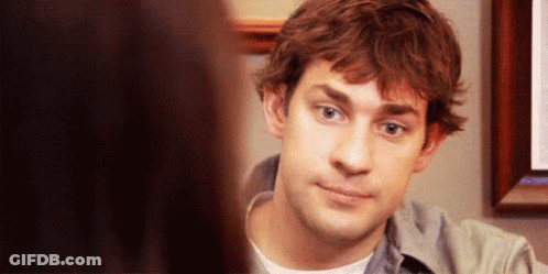 A Close Up Of A Man 'S Face Looking At A Woman . GIF