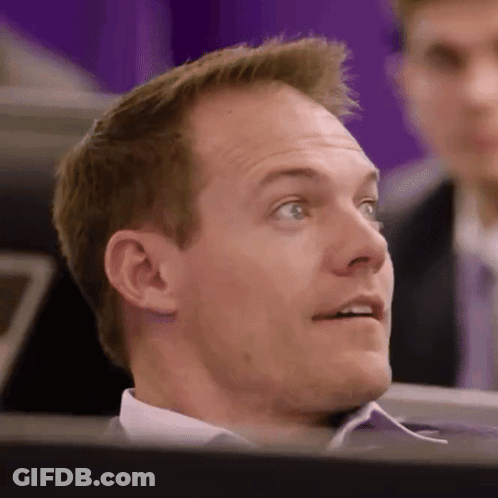 A Close Up Of A Man 'S Face Looking Up At Something GIF