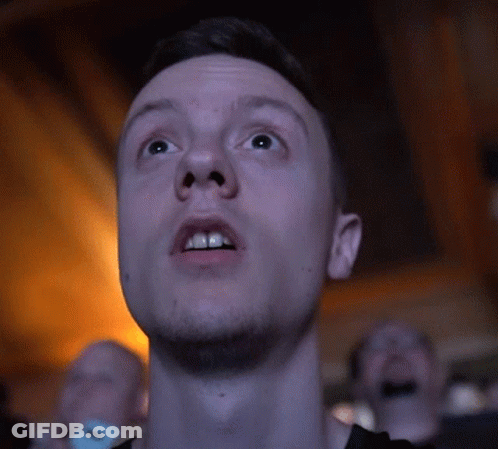 A Close Up Of A Man 'S Face Looking Up GIF