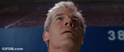A Close Up Of A Man 'S Face Looking Up . GIF