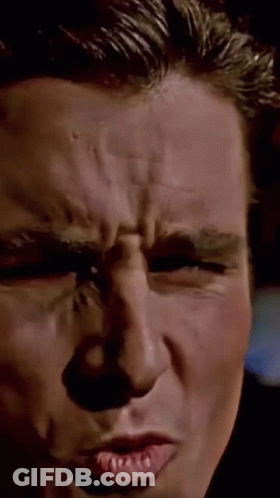 A Close Up Of A Man 'S Face Making A Funny Face GIF