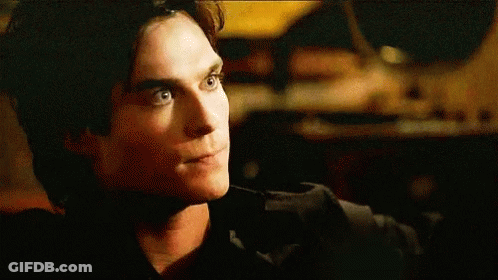 A Close Up Of A Man 'S Face Making A Funny Face . GIF