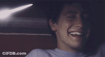 A Close Up Of A Man 'S Face Smiling GIF