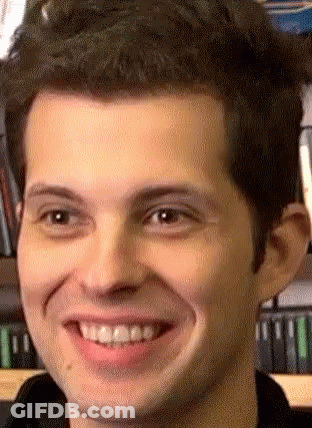 A Close Up Of A Man 'S Face Smiling GIF