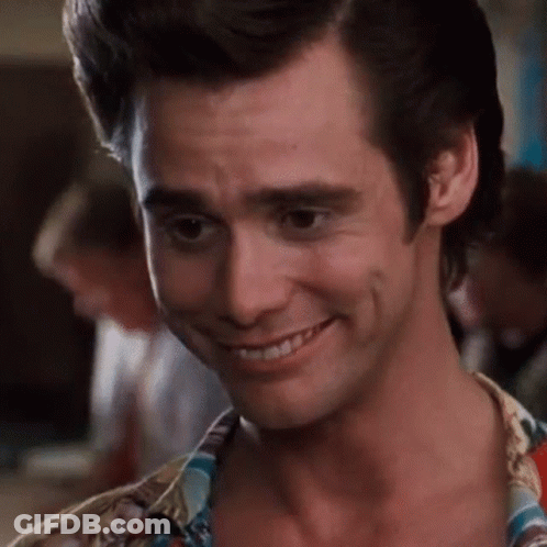 A Close Up Of A Man 'S Face Smiling GIF