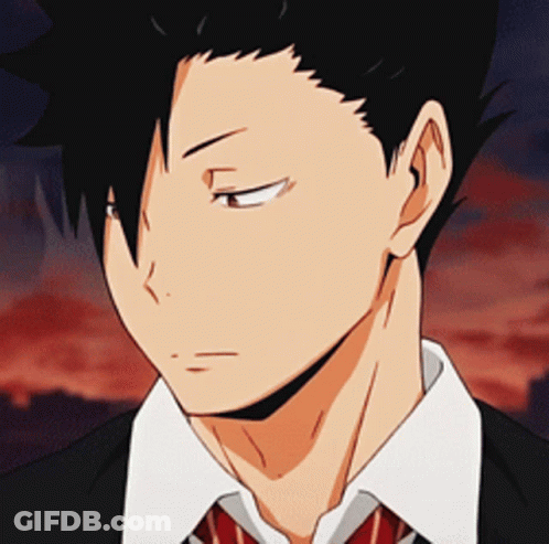 A Close Up Of A Man 'S Face Wearing A Suit And Tie With His Eyes Closed GIF