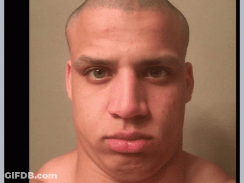 A Close Up Of A Man 'S Face With A Bald Head GIF