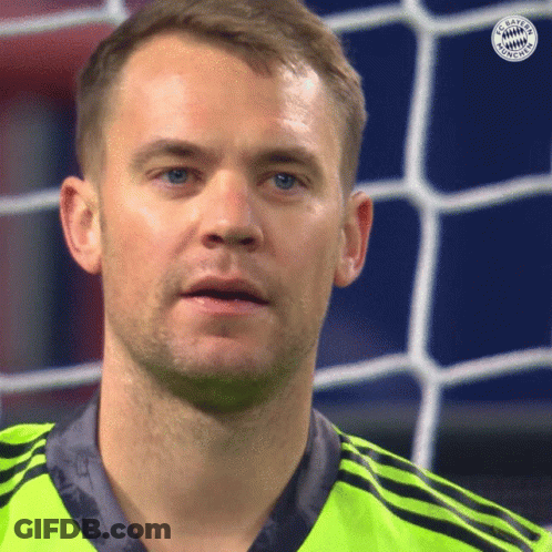 A Close Up Of A Man 'S Face With A Bayern Munich Logo In The Corner GIF