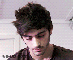 A Close Up Of A Man 'S Face With A Beard GIF