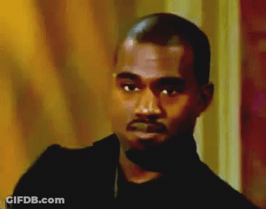 A Close Up Of A Man 'S Face With A Beard And A Black Jacket . GIF