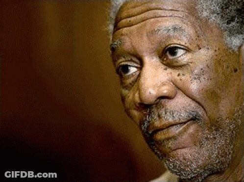 A Close Up Of A Man 'S Face With A Beard And A Serious Look On His Face . GIF