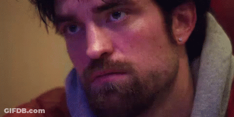 Close Up Of Bearded Man With Earring GIF