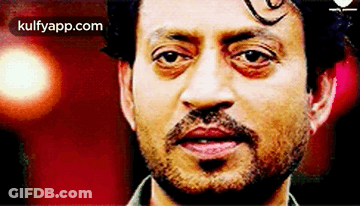 A Close Up Of A Man 'S Face With A Beard And Mustache . GIF