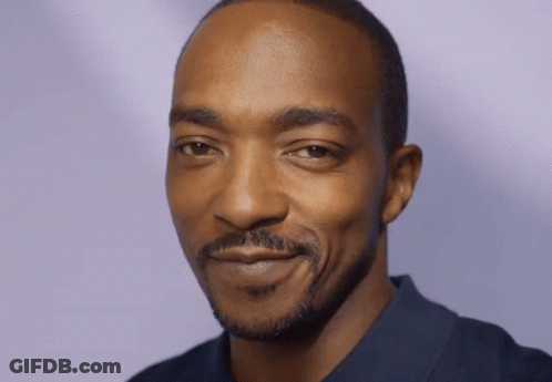 A Close Up Of A Man 'S Face With A Beard GIF